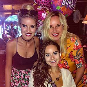 Sarah Carey with two daughters in portrait
