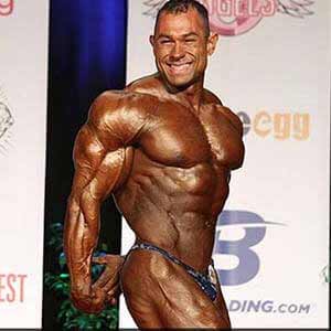 Matt Porter flexing for bodybuilding show in photo