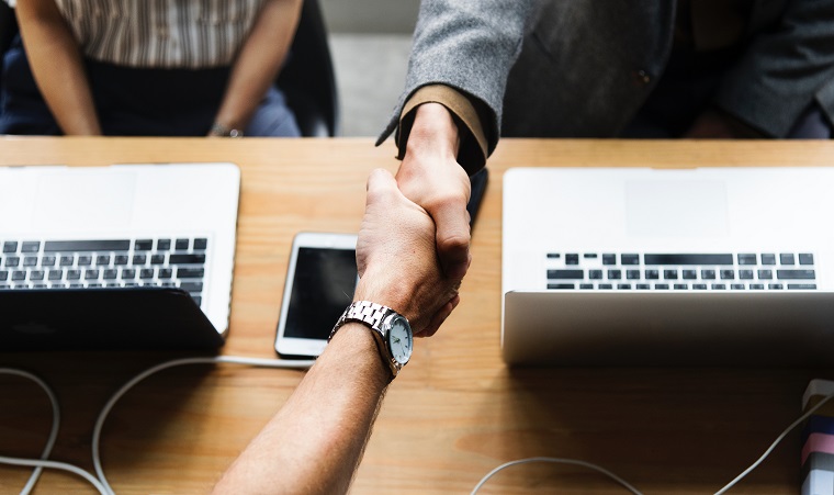 what-is-a-marketing-communications-plan-handshake