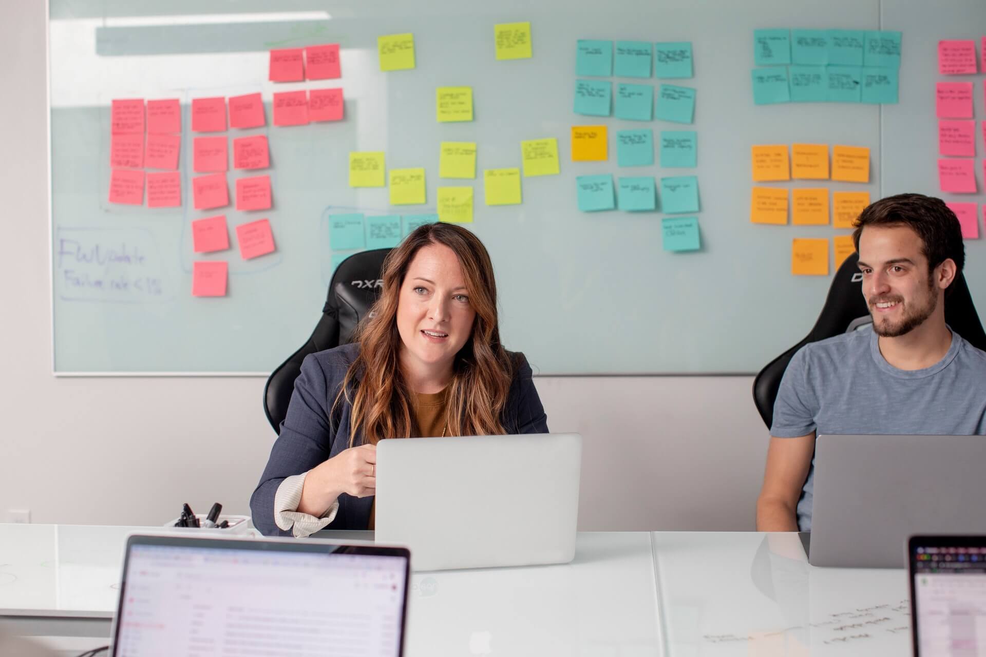 a woman and a man having a meeting