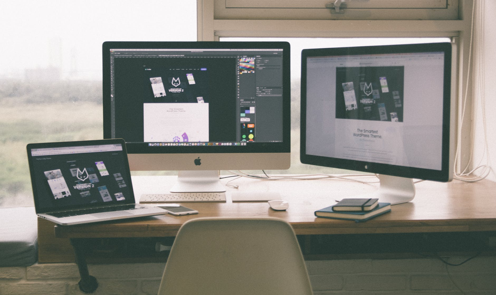 Designer workspace three monitors