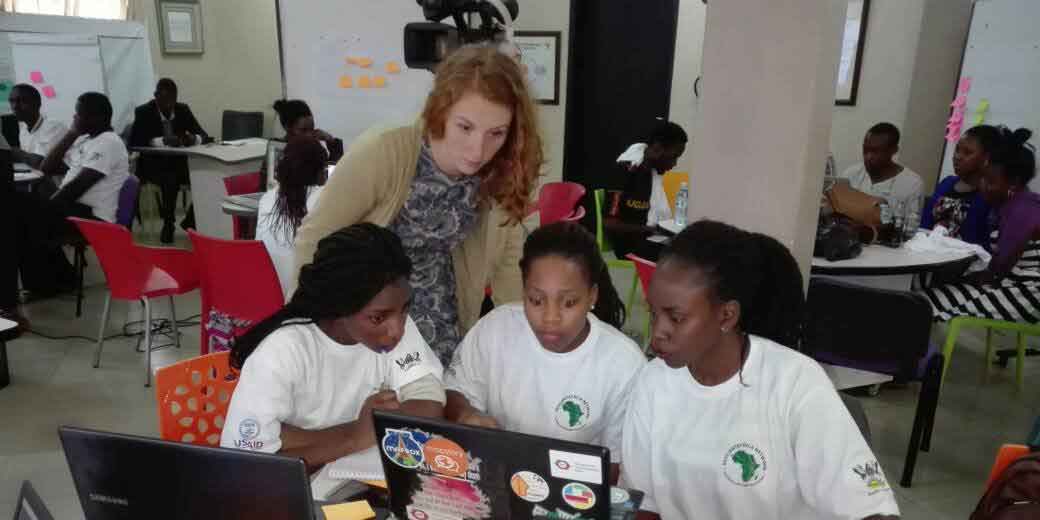 AidData Summer Fellow Allison Bowers worked to answer a team’s questions at the 2017 RAN-AidData GIS Hackathon.