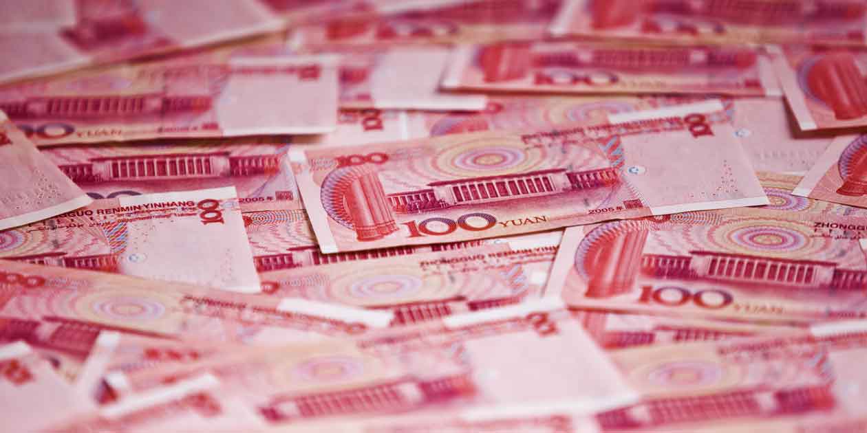 Piles of 100 notes of Chinese Yuan — AidData releases first ever dataset on Chinese global development spending