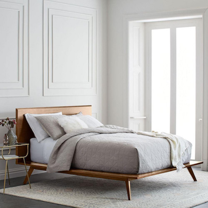 West Elm Mid-Century platform bed with mattress in white room