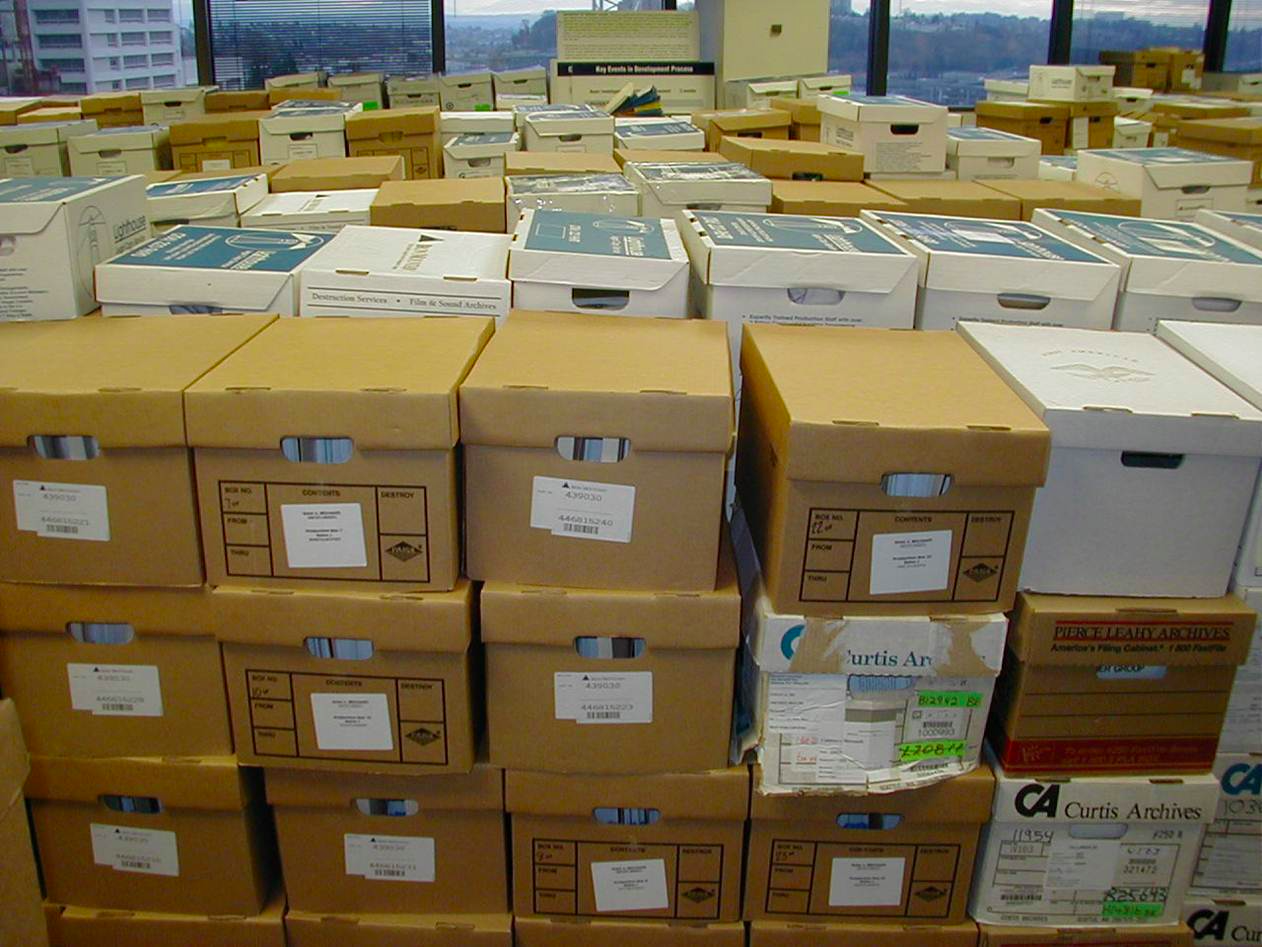 Several rows of person-high stacks of Bankers Boxes