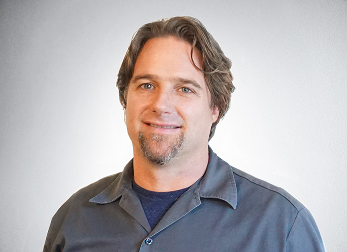 Most people spend a majority of their life in and amongst the built world, influenced by the spaces they reside in. Kale wants to be a part of shaping that world, creating a positive influence in people’s lives. To that end, Kale has over 20 years of experience in the industry of architecture, landscaping, design and construction. He has extensive experience in the healthcare field with medical and hospital projects ranging from 150K to over 1M square feet in San Francisco, Palo Alto, San Jose, Walnut Creek, Vallejo and Sacramento. Kale’s experience in both architecture and construction lends itself to a different kind of integrated philosophy behind the process of project delivery. With extensive training in Toyota Way, LEAN, Last Planner and Integrated Project Delivery systems along with an intimate knowledge of OSHPD, BIM, Code Compliance and a high sense of design integrity Kale stands squarely on the line of responsible and professional architecture for construction. Were Kale to be stranded on a desert island, he would be sure to have his “Sailing the Seas of Cheese” album by Primus, and plenty of Tahoe Trail Bars. Don’t ask him what’s on his bucket list – he doesn’t keep one. Live for today!