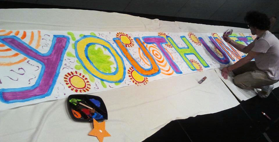 Youth painting banner