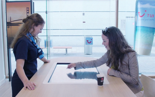 Interactive experience in a TUI Group agency, made by First Impression Audiovisuel with Intuiface