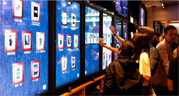 Users interacting with different touchscreens