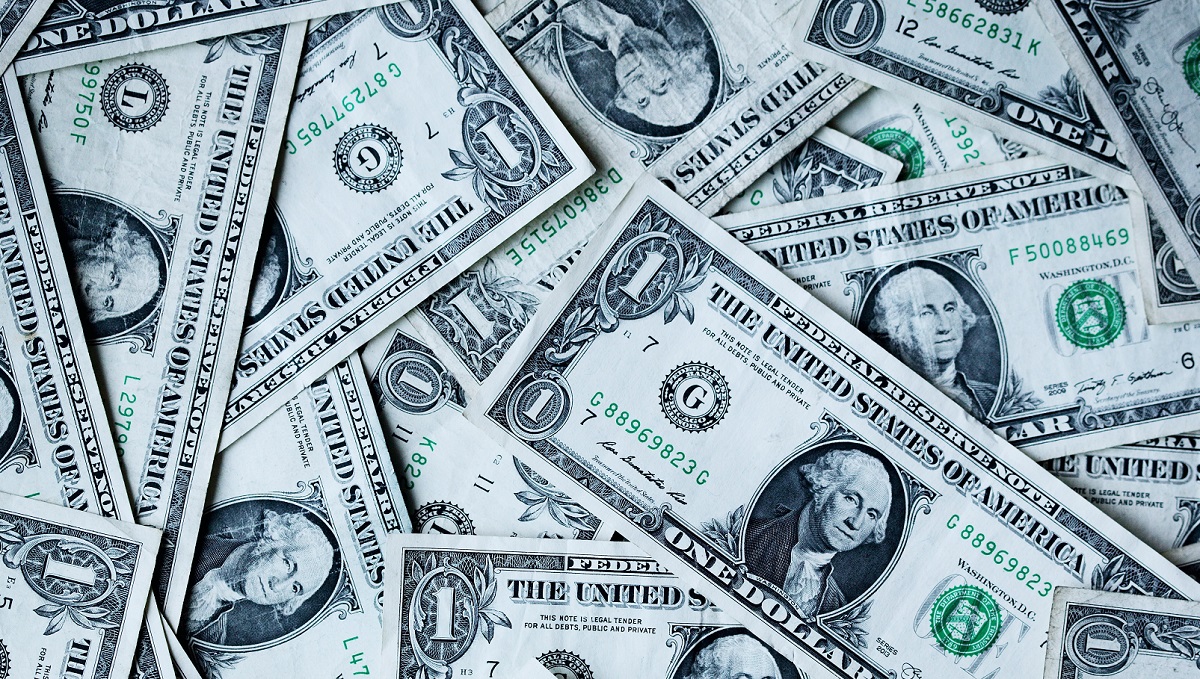 One dollar bills randomly spread out