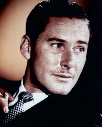 Errol Flynn with his trademark pencil moustache
