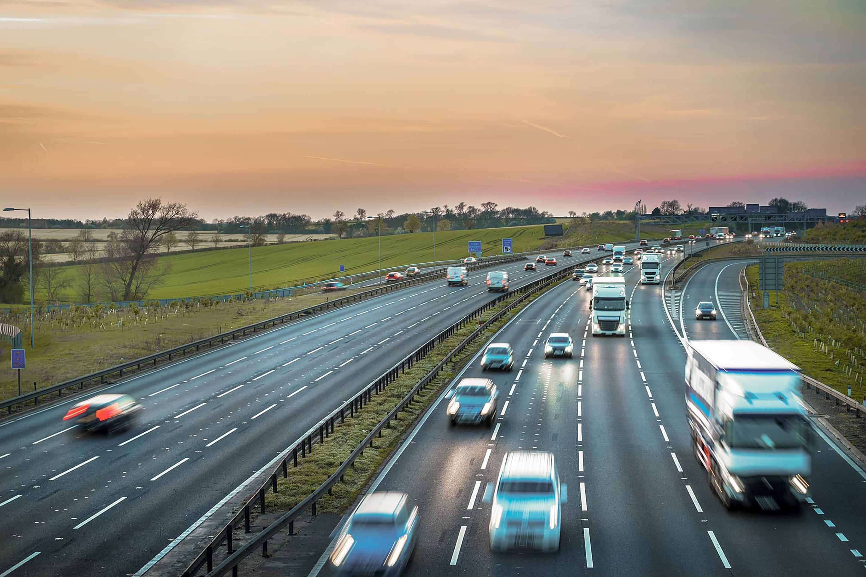 a motorway at sunset