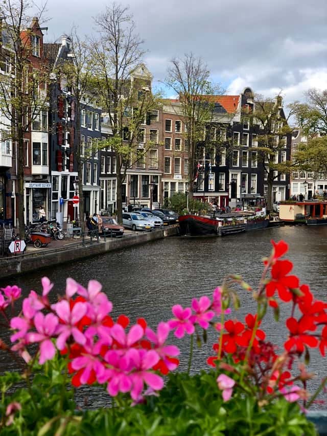 A view of the busy and vibrant canal of amsterdam