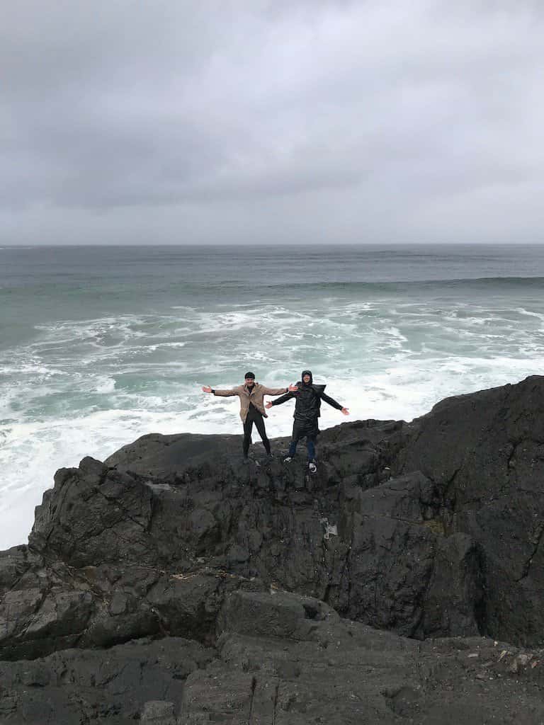 Climbing rocks along the beach
