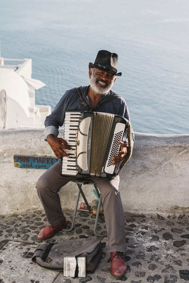 Local musician busking in Santorini