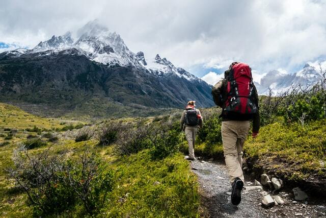 hiking and backpacking travelers with their backpacks