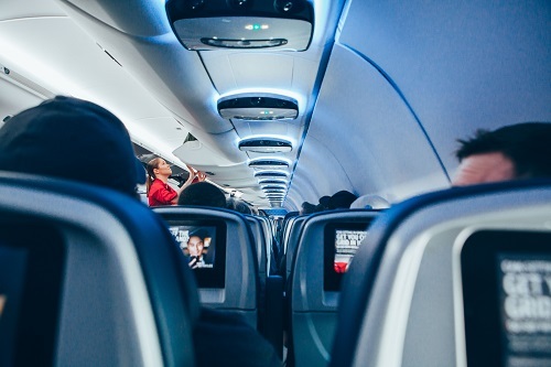 Traveling on an airplane with cheap flights from YYZ Deals.