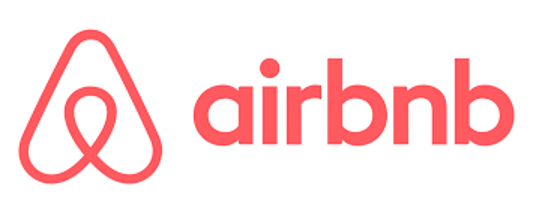Airbnb vacation rental site logo.