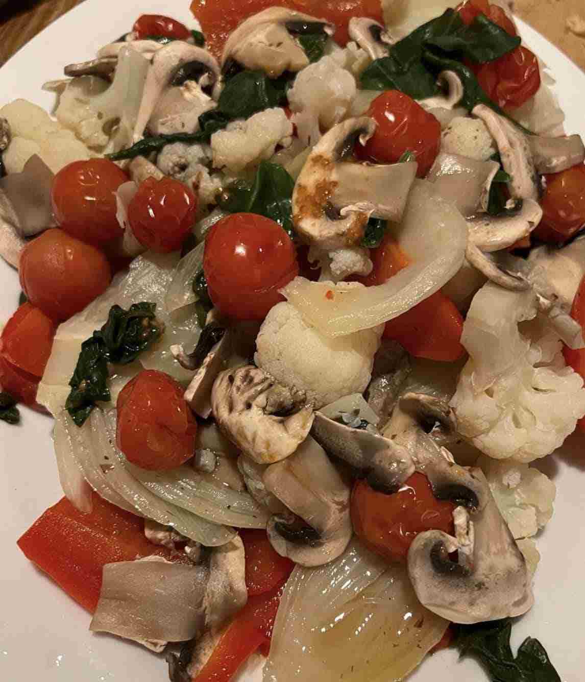 Vegetable salad with mushrooms, cauliflower, tomatoes and more