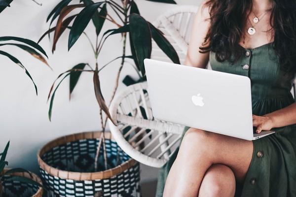 Woman working on Macbook