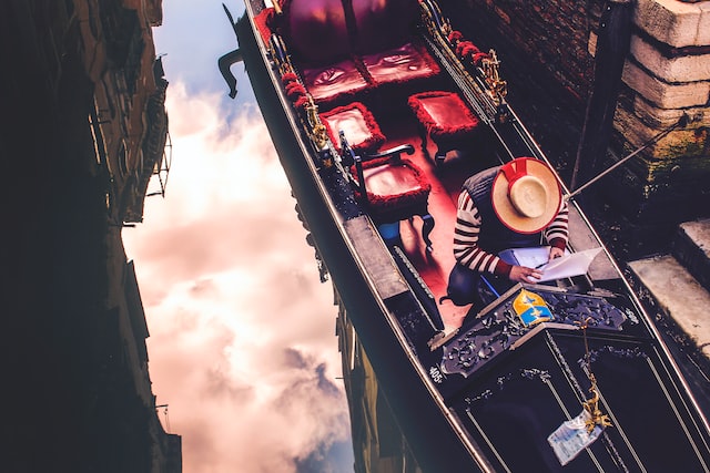 man in a gondola in Venice, Italy