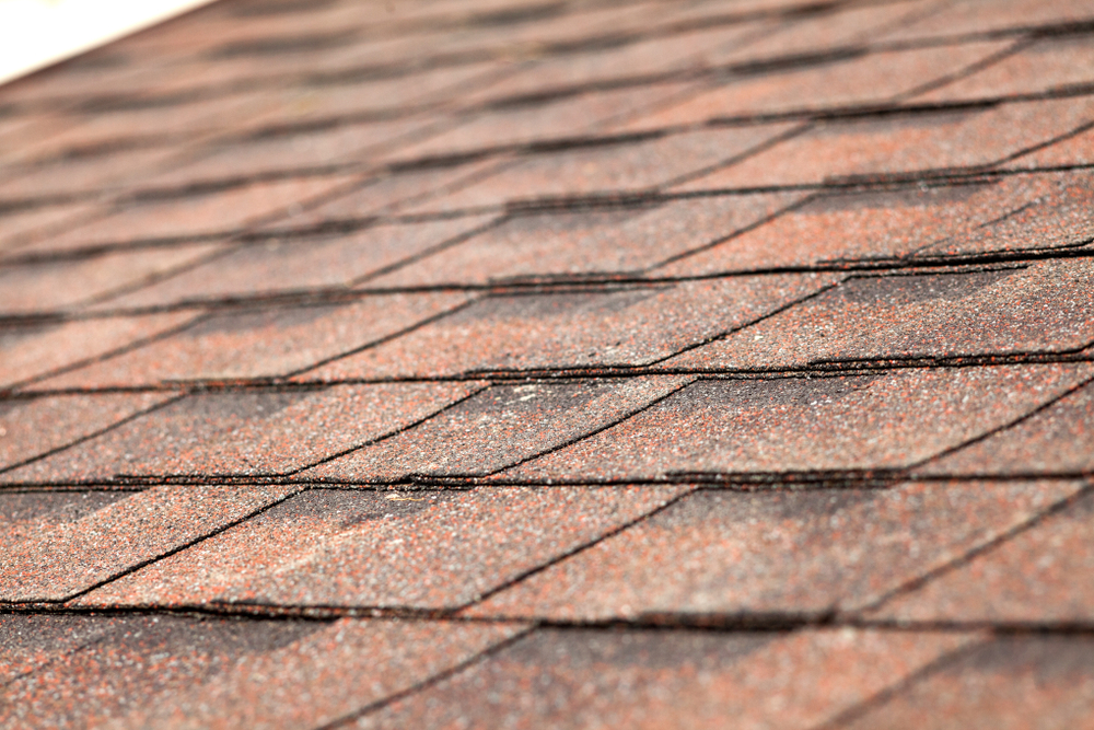 The Pros and Cons of Putting New Shingles Over Old Ones Lewis Roofing