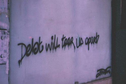 Wall graffiti protesting student debt