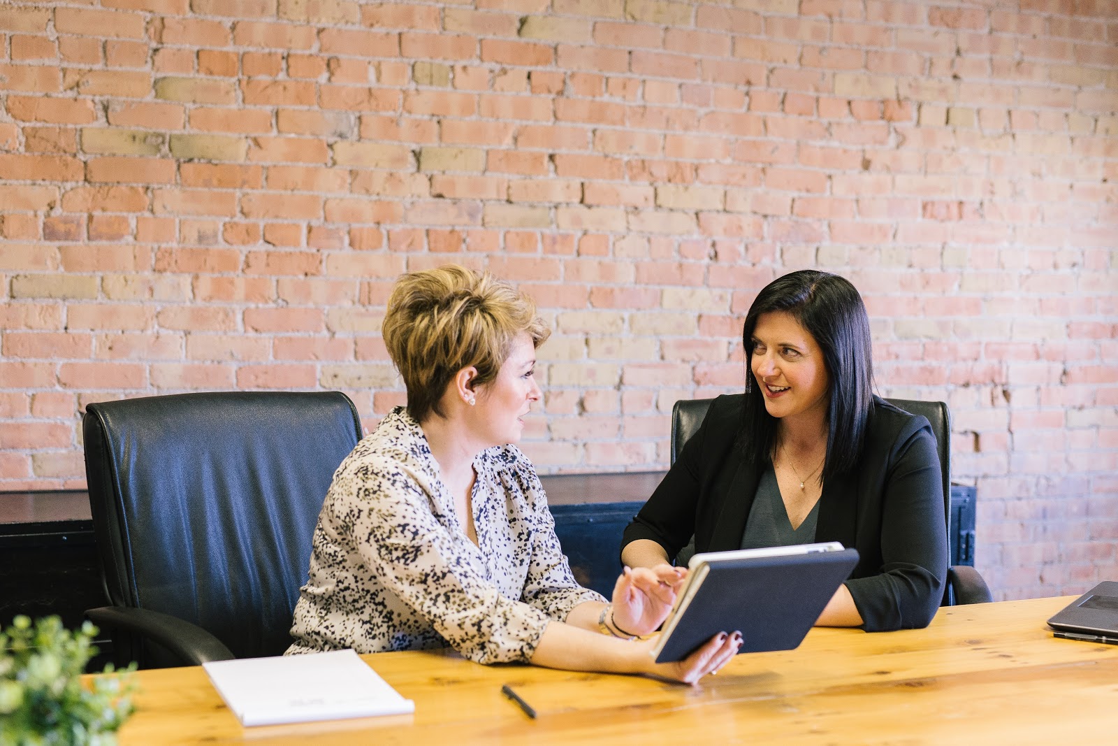 Female HR professionals discussing a candidate