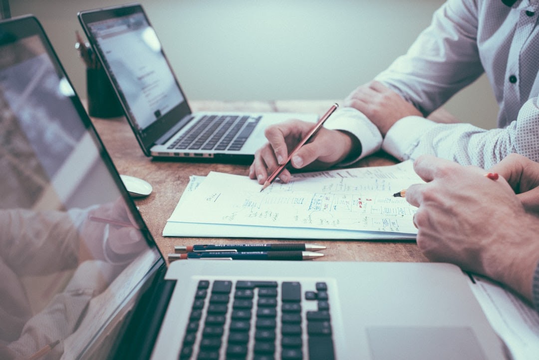 HR professionals assessing HRIS