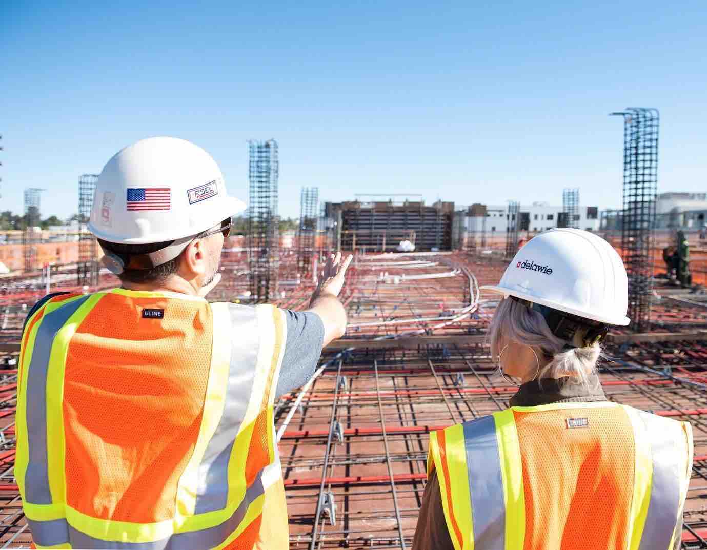 A foreman onboarding an employee