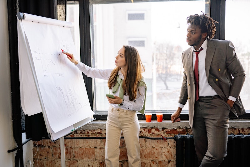 Two managers strategizing an account
