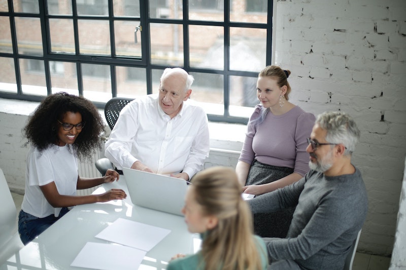 Clients discussing their accounts happily