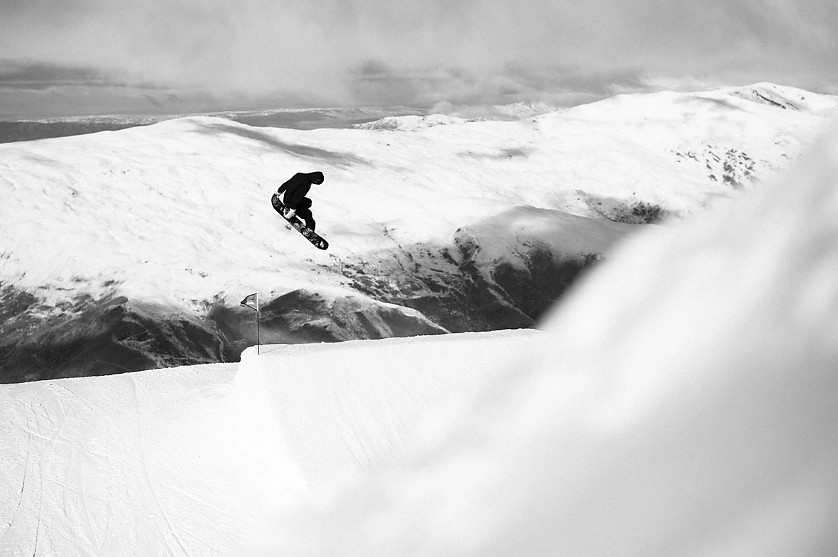 Snowboarder flying through the air