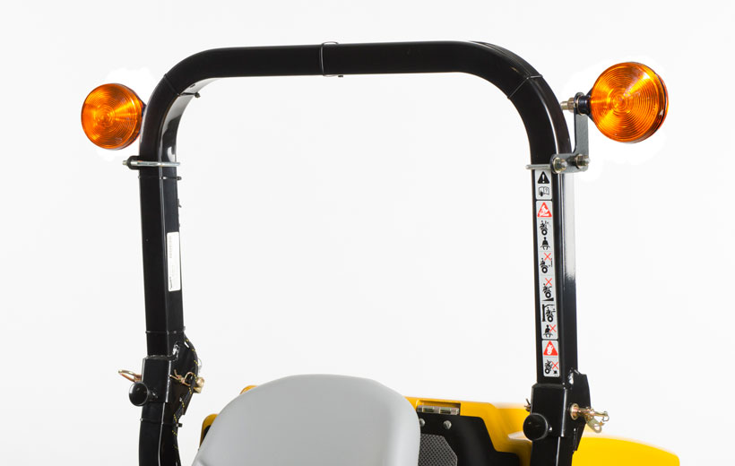 Image of the roll over bar of a mower with 2 orange lights mounted on either side.