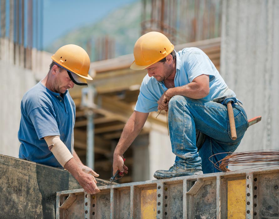 subcontractors working on commercial construction project
