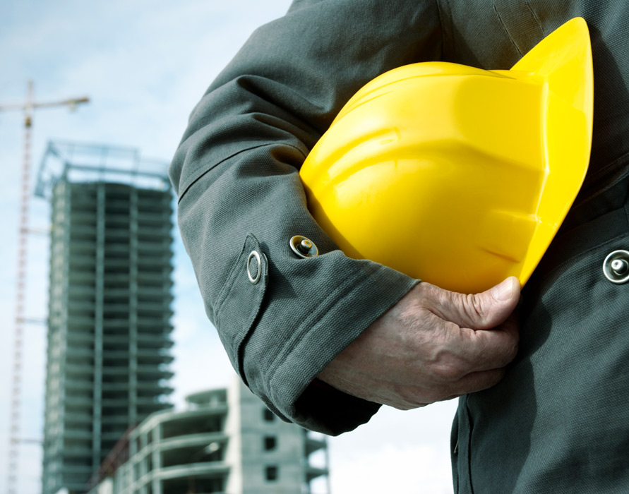 contractor standing in front of building