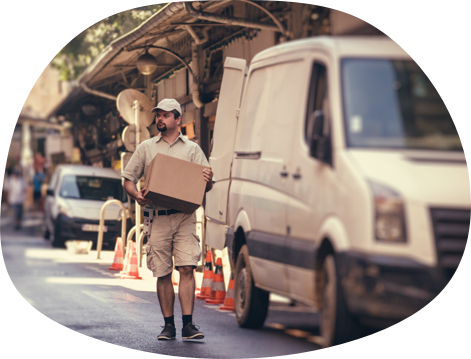 Delivery man carrying a box