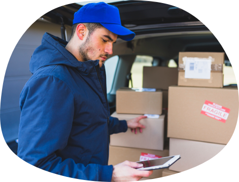 Delivery man scanning a shipping label