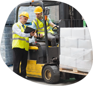 Forklift driver receiving instructions in a warehouse