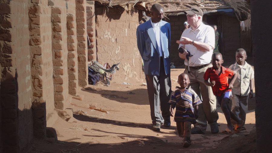 Tom Albinson with a refugee pastor in Dzaleka refugee camp, Malawi. Photographer: T.Barnes