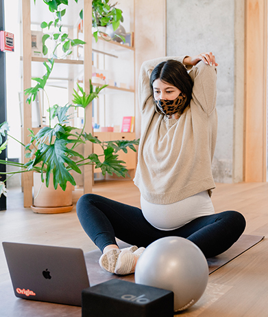 Pregnant woman doing virtual physical therapy