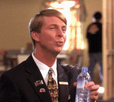 Man nervously drinking water