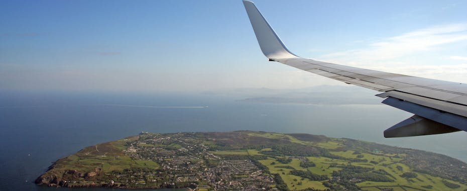 Plane wing over Ireland