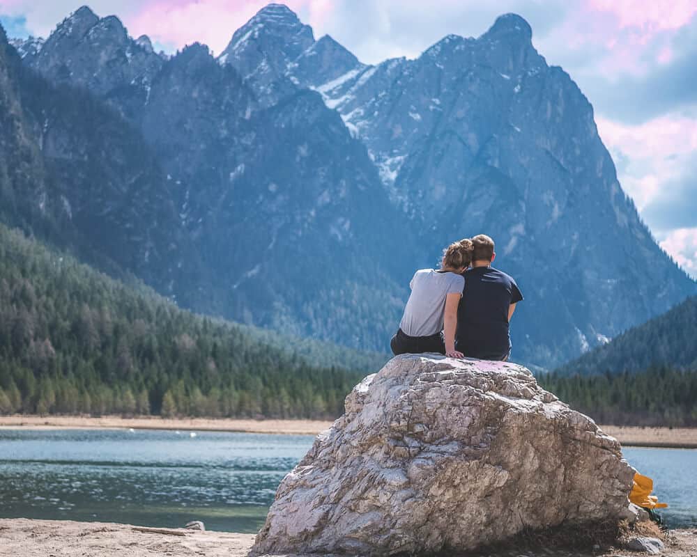 Married couple overlooking mountainscape