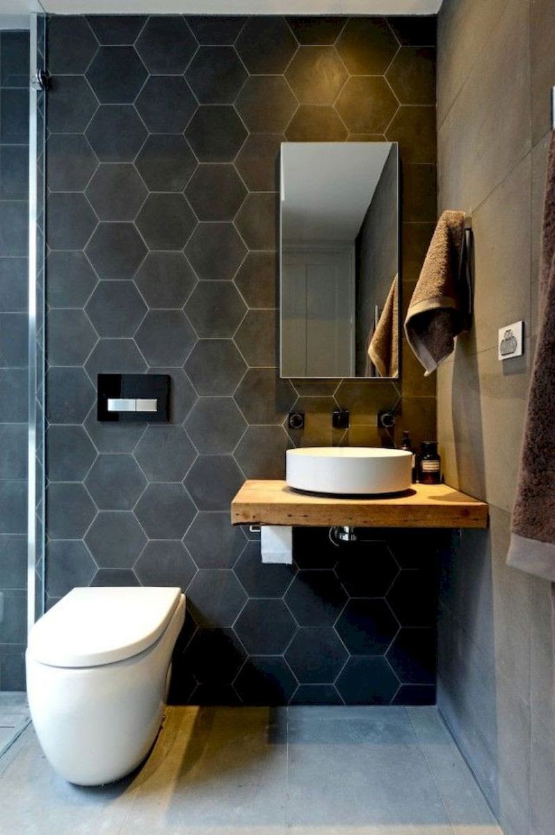 banheiro revestimento hexagonal preto