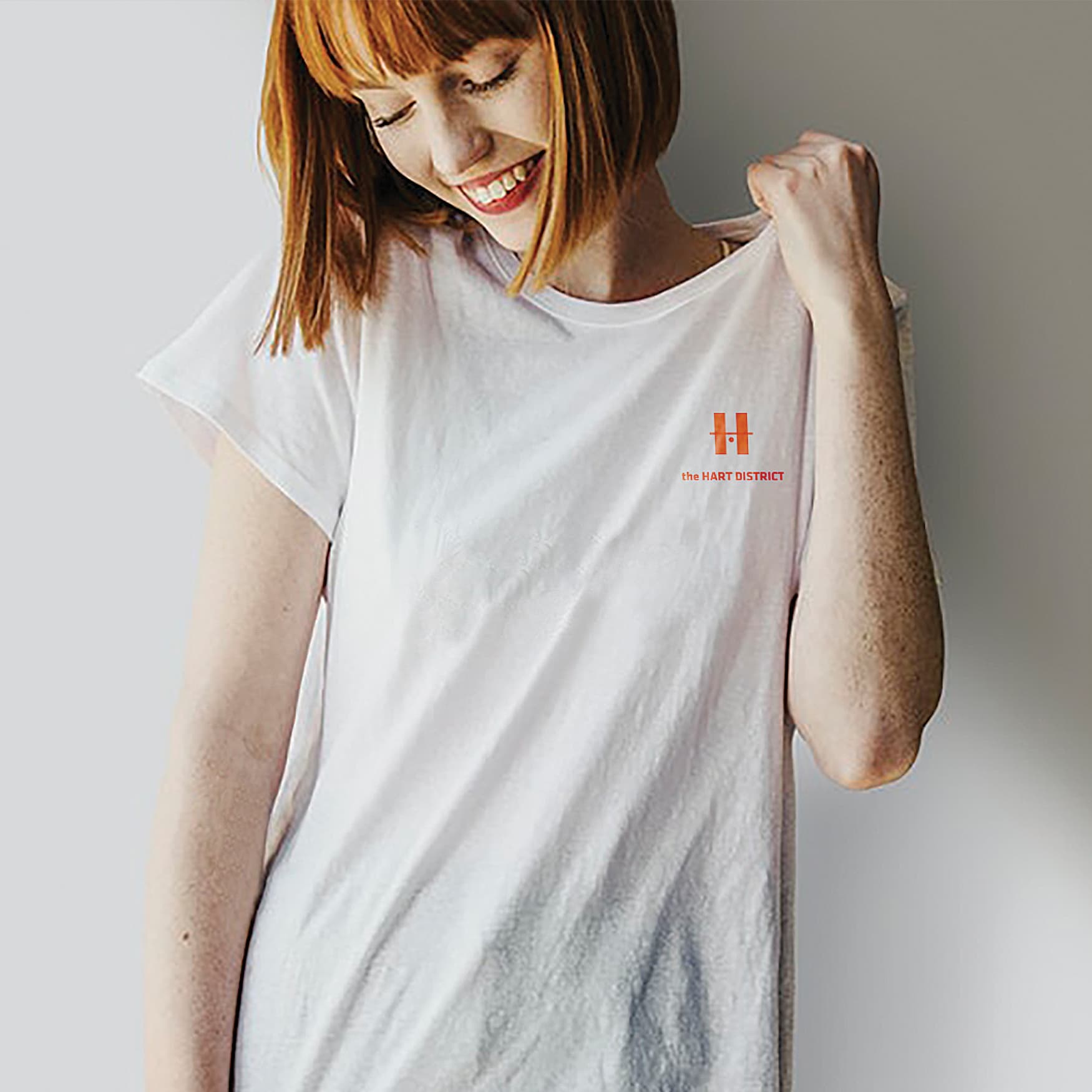 Logo and logo mark on a white tshirt for the HART District.