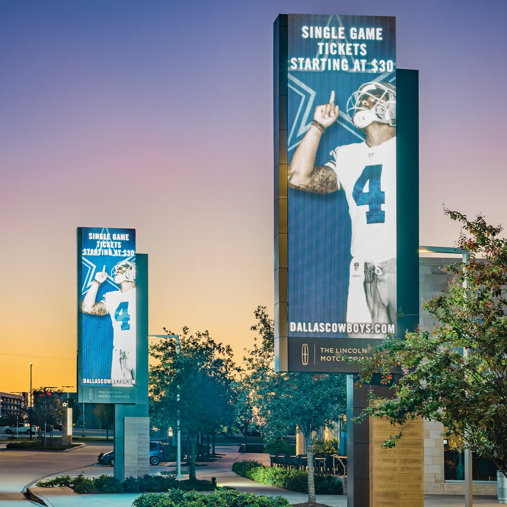 Person throwing a football at The Star in Frisco, Texas