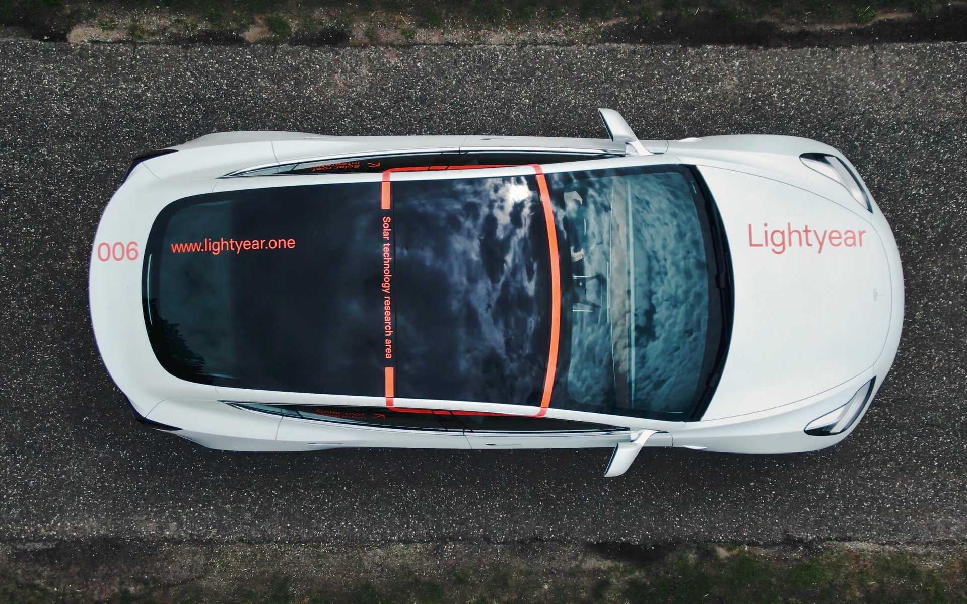 Tesla with solar powered roof, provided by Lightyear