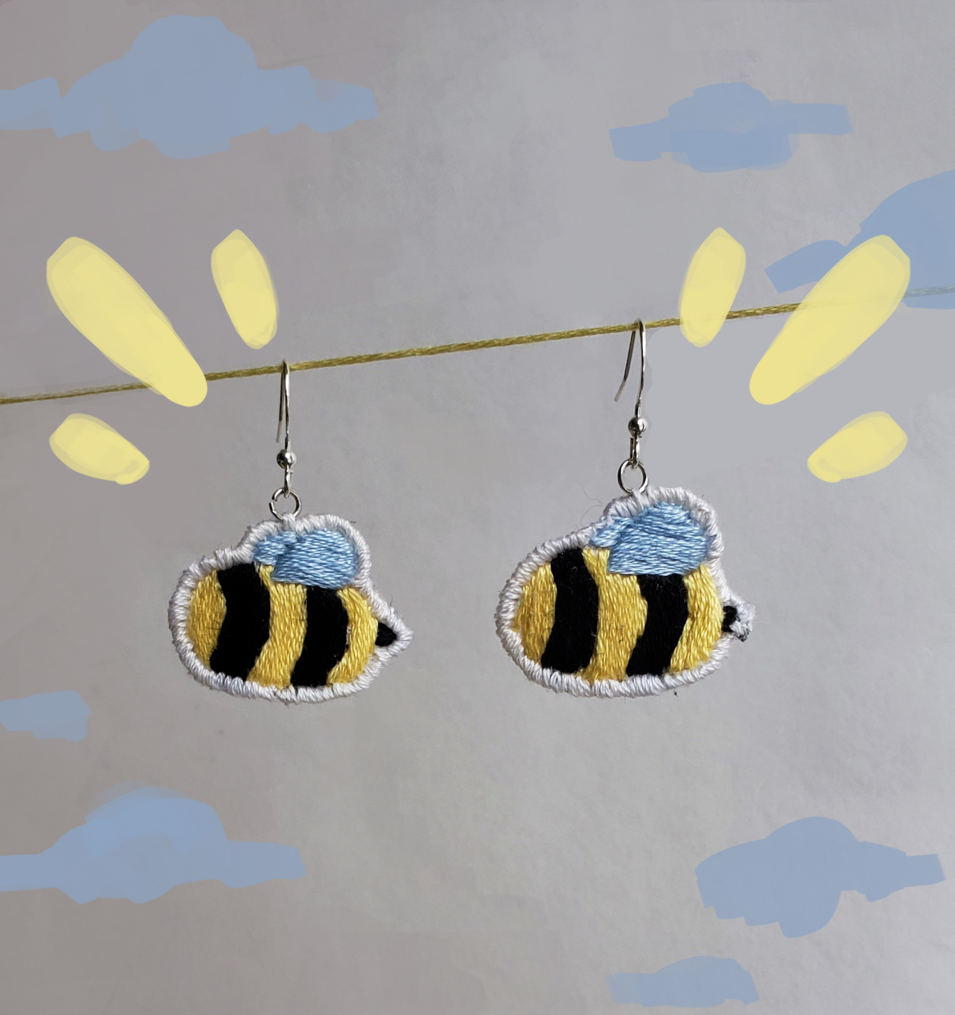 Image 4 - An embroidered bee earring set
