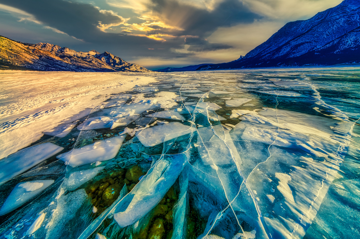 Abraham Lake in the Canadian Rockies of Alberta comes alive in the long and cold winter with staggering beauty.